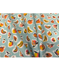Sirop” – Tissu coton imprimé petits fruits sur fond turquoise
